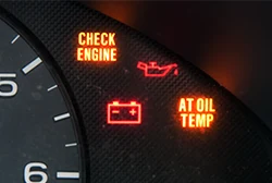 A car's dashboard showing numerous warning lights